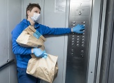 Andrey Arshavin delivering food parcels on behalf of the club and Yandex Lavka
